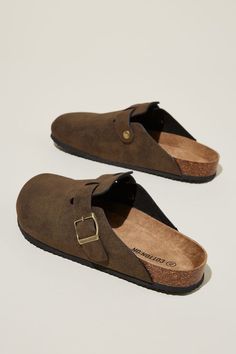 Brown Synthetic Slip-ons, Synthetic Round Toe Clogs With Buckle Closure, Brown Slip-ons With Textured Footbed, Brown Textured Footbed Slip-ons, Brown Textured Slip-ons, Brown Synthetic Mules With Cork-bed Midsoles, Casual Synthetic Mules With Cork-bed Midsoles, Synthetic Clogs With Textured Footbed And Round Toe, Brown Synthetic Slip-ons With Leather Sole