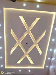 the ceiling is decorated with white lights and an x design on it's side