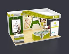 an exhibition stand with green and white accents