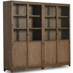 a large wooden bookcase with glass doors