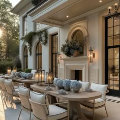 an outdoor dining area with tables and chairs