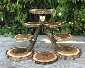 three tiered cake stand made out of tree slices