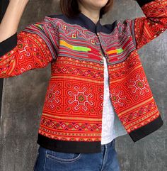 This is 100% Hand embroidered Jacket. Handmade 100% by Hmong hilltribe in Thailand. Hemp fabric which is soft and comfortable. One of a kind Jacket, super unique Size : Bust 42 inch, Length 21 inch, Sleeves 19 inches Long Sleeve Embroidered Outerwear With Pockets, Multicolor Embroidery Long Sleeve Outerwear With Pockets, Embroidered Long-sleeve Cotton Blazer, Casual Embroidered Long Sleeve Outerwear, Embroidered Long Sleeve Cotton Blazer, Embroidered Cotton Outerwear With Stand Collar, Embroidered Cotton Long Sleeve Blazer, Embroidered Stand Collar Top For Fall, Casual Long Sleeve Embroidered Outerwear