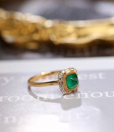 *Condition: Brand new *Center Stone: Natura Emerald from Zambia, approx 0.68ct, 6x6mm (IF clarity, 5A color) *Side Stone: Natural White Diamond, Round Cut & Baguette Cut (VS1 clarity and F color) *Gold Weight: 3.41g (depand the ring size) *Ring Dimension: approx 10x10x8.5mm *Metal Purity: Can be select Each piece is made-to-order with care and special attention to detail. all items are made with conflict-free diamonds and gems. Size: made to order The item will be gift wrapped and shipped. - Luxury Gold Emerald Round Ring, Timeless Gold Diamond Ring With Emerald, Timeless Emerald Diamond Ring In Yellow Gold, Luxury Gold Emerald Ring, Elegant Gold Halo Ring With Gemstone, Elegant Baguette Cut Cluster Ring With Gemstone, Elegant Baguette Cut Gemstone Cluster Ring, Timeless Yellow Gold Emerald Diamond Ring, Timeless Yellow Gold Diamond Ring With Emerald