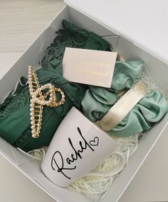 a box with some green items in it and a name tag on the cup that says, hello you're my bride