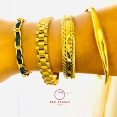 "New!! The Cuff Stack |  18K Gold Filled Cuffs | Love Bracelets I Stacking Bangle | Tarnish Resistant | Wristwatch link| Hypoallergenic Bracelet Details: Material: 18K Gold Filled | Black Vegan Leather Base Metal: Stainless Steel Bracelet Style: The Ultimate Bangle Stack                             Paris:  $34.00  each                             Luna: $47.00 each                             Donna:  $47.00 each                             Monte: $47.00 each                            The Ultimate Stack All (4) = $131.00 Save $10.00  Paris Bracelet: $34.00 Material: 18K Gold Filled | Stainless Steel | Black Vegan Leather Length: 5\" + 2\" extension link extends to 7\" inches long Adjustable: YES Weight: 0.32 oz Luna: $47.00  Material: 18K Gold filled | Stainless Steel Link: wristwatch link Gold Stackable Adjustable Cuff Bracelet, Timeless Stackable Yellow Gold Cuff Bracelet, Stackable Yellow Gold-plated Bangle, Gold-plated Stackable Cuff Bracelet As Gift, Luxury Tarnish-resistant Gold-plated Cuff Bracelet, Paris Bracelet, Stacked Bangles, Love Bracelets, Cuff Bangles