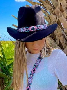 Embellish your favorite hat with beaded tribal patterns in a variety of delicious colors! All hat bands include adjustable leather cords so they hug perfectly on all sized hats! All hat bands measure approximately 1"W x 36"L. *Hat pictured not included Handmade in Guatemala  *Please note that all of our items are handcrafted and unique to each piece. Also, colors may vary slightly based on your device. Like what you see here? Check out all of our beautiful handmade products and follow us on Face Adjustable Multicolor Hat For Western-themed Events, Bohemian Multicolor Hat For Western-themed Events, Adjustable Western Hat For Music Festival, Traditional Handmade Black Hat Bands, Bohemian Black Hat Band For Western-themed Events, Adjustable Beaded Hat Band For Festivals, Bohemian Black Hat For Western-themed Events, Handmade Fedora Hat Bands For Festivals, Handmade Bohemian Hat Band For Festivals