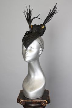 This is a one of a kind piece of wearable art made for the Five and Diamond Seventh Annual Headgear Art Show and shown on August 2, 2019. The 'venado' cocktail hat is a one-of-a-kind headpiece which will effortlessly carry you through your adventures in time and space. The arapaima fish leather has been hand-moulded with steam and water on a wooden hat form, and then hand-stitched. Designed by Jasmin Zorlu Millinery One of a kind Unisex MATERIALS USEDArapaima vegetable tanned fish leather from B Luxury Adjustable Hat, Handmade High Crown Top Hat For Party, Adjustable High Crown Headpieces For Evening, Handmade Mini Hat With Structured Crown For Kentucky Derby, Handmade Structured Crown Hat For Kentucky Derby, Handmade Hat Headpieces For Evening, Handmade Evening Costume Hats, Handmade Hats With Structured Crown For Kentucky Derby, Handmade Mini Hat For Kentucky Derby Evening