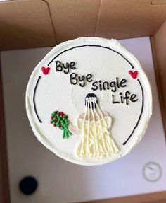 a cake with the words bye single life written on it in black and white icing