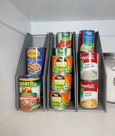 an organized pantry with canned food items