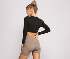 This crop top brings all the hype for your outfit. The crop top features a round neckline. fitted long sleeves. and a cropped hem. Complete your look with high waist biker shorts and chunky sneakers.Fit & Features Round neckline Fitted long sleeves Cropped hem Smooth knit fabric Form hugging fit Model is 5'9" with a 32" bust. 24" waist and 34" hips. She is wearing a size small. Homecoming Outfits, The Hype, Selling Clothes, Chunky Sneakers, White Crop Top, Biker Shorts, Black Crop Tops, Round Neckline, Knit Top