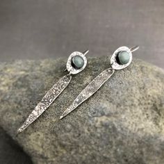 These sterling silver dangle earrings with a 8 mm cloudy aquamarine gemstone are made of 2 components connected with a sterling silver jump ring.  Oxidised to highlight the texture. The earwires are soldered fixed onto the earrings. Length is approximately 6.3 mm / 2.48 inch earwires not included. Diameter aquamarine is 8 mm. This is the exact pair you are going to receive. They come in a little box, ready for gifting. I ship with Bpost, the Belgian postal service. NATIONAL (within Belgium) ever Earring Design Ideas, Earring Inspiration, Brace Yourself, Earrings Inspiration, Silver Dangle Earrings, Sterling Silver Dangle Earrings, Round Stud Earrings, Earring Ideas, Diamonds And Gold