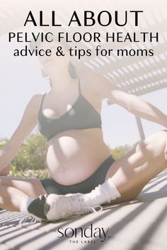 a pregnant woman sitting on the ground with her legs crossed