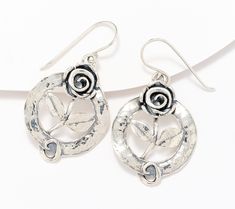 Flower power finds its way into the detailed design of these stunning drop earrings featuring an artistically crafted rose. The floral face framers spark springtime vibes year round. From Or Paz® Sterling Silver Jewelry. Face Framers, Detailed Design, Drops Design, Earrings Sterling Silver, Silver Roses, Spring Time, Ear Piercings, Flower Power, Sterling Silver Earrings