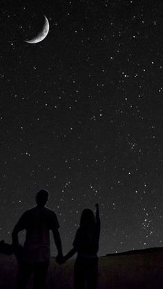 two people looking at the stars in the night sky, one holding hands while the other holds his hand