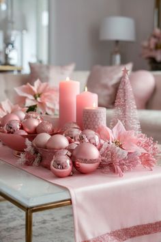 A coffee table set with pink Christmas decor, featuring ornaments, candles, and poinsettias for a soft, festive touch. Pink Christmas Decorations Living Room, Christmas Decor Ideas For Table, Stanley Christmas, Christmas Coffee Table Decor Ideas, Coffee Table Displays, Pink Christmas Table, Christmas Coffee Table, Christmas Coffee Table Decor