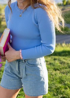 This is such a good go-to top for the spring and summertime. It looks so good on its own, but it's also amazing when it comes to layering with other pieces. The fit is stretchy, comfortable and flattering all at once! hal is 5'8 and wearing a size M size S: 18.5" length, 17" width size M: 18.5" length, 19" width size L: 19" length, 21" width width measurement = armpit to armpit while lying flat paired with the drawing hearts in the byline shorts this fabric is viscose and polyester with lots of