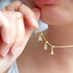 Our customisable charm jewelry serves as a dainty and personal piece. It comes in two options: necklace OR bracelet and I'm in love with both. Feel free to personalise it anyway you want in alphabet and/or numerical charms. What would you come up with as a self expression? We are offering this piece in 14K Gold Plated 925S Sterling Silver, rhodium plated. It is the only piece that is not offered in stainless steel or solid gold. The rhodium plating makes this beautiful personalised jewelry hypoa Customized Adjustable Pendant Charm Necklace, Customized Adjustable Pendant Jewelry, Adjustable Nameplate Jewelry, Adjustable Charm Necklaces For Personalized Gifts, Adjustable Charms Necklaces For Personalized Gift, Adjustable Charms Necklace For Personalized Gift, Adjustable Necklaces With Charms For Personalized Gift, Customizable Adjustable Pendant Charm Necklaces, Customizable Adjustable Pendant Charm Necklace