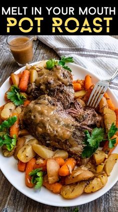 a white plate topped with meat and veggies