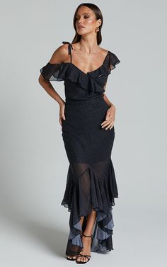 Get ready to make a statement at your next party with our Artemisia Maxi Skirt! This flirty and playful skirt features frill details and a sheer high-low design that is guaranteed to turn heads. Made from chiffon and polyester, this black polka dot skirt is perfect for any occasion. Whether you're twirling on the dance floor or sipping cocktails with friends, the fit and flare silhouette will accentuate your figure and keep you feeling fabulous all night long. Pair it with heels for an elevated Skirt Frill, Black Polka Dot Skirt, Cocktails With Friends, Basic Black Dress, Neon Outfits, Bachelorette Dress, Spring Maxi Dress, Frill Tops, High Low Skirt