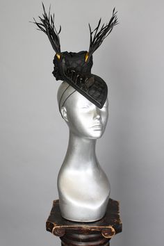 This is a one of a kind piece of wearable art made for the Five and Diamond Seventh Annual Headgear Art Show and shown on August 2, 2019. The 'venado' cocktail hat is a one-of-a-kind headpiece which will effortlessly carry you through your adventures in time and space. The arapaima fish leather has been hand-moulded with steam and water on a wooden hat form, and then hand-stitched. Designed by Jasmin Zorlu Millinery One of a kind Unisex MATERIALS USEDArapaima vegetable tanned fish leather from B Luxury Adjustable Hat, Handmade High Crown Top Hat For Party, Elegant Black Ceremonial Costume Hats And Headpieces, Evening Headpiece With Tall Crown, Adjustable High Crown Headpieces For Evening, Handmade Mini Hat With Structured Crown For Kentucky Derby, Handmade Structured Crown Hat For Kentucky Derby, Unique Black Adjustable Costume Hats And Headpieces, Unique Adjustable Black Costume Hats And Headpieces