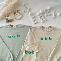 This cute scandinavian inspired matching Christmas gingerbread  family outfit is perfect for holiday festivities, Christmas pregnancy announcements, and Christmas photoshoots! This is also perfect for gifting to your loved ones!  Note: This is not sold as a set, each sweatshirt/shirts needs to be purchased individually! :)  Our sweatshirts run in a UNISEX fit. The sweaters naturally have a slightly oversized fit giving extra room for moving around and comfort! For this reason, we highly recommen Christmas Pregnancy Announcement Family, Christmas Sweaters Family, Matching Family Christmas Sweaters, Matching Christmas Pajamas Family, Family Christmas Sweatshirts, Christmas Family Outfits, Family Matching Christmas Pajamas, Family Sweatshirts, Matching Christmas Sweaters