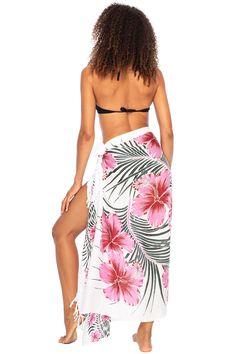 HAWAIIAN PARROT SARONG. Striking parrot sarong wrap with vibrant tropical colors gives you an exotic look and feel. Trimmed with boho fringed edges. Includes a coconut clip for easy tying GENEROUSLY SIZED at 67x 45, this swimsuit cover up fits most sizes. Wear it as a sarong skirt, wrap as a pareo dress, or wear as a shawl. Use for a beach blanket, tablecloth, even a colorful wall hanging 100% RAYON. With a soft, silky feel, rayon is a natural fiber that lets skin breathe. This bathing suit or b White Floral Print Swimwear For Beach Cover-up, Beach Season Wrap Sarong For Pool, Wrap Sarong For Pool And Beach Season, Beachy Wrap Sarong For Pool, White Wrap Cover-up For Beach Party, Hawaiian Printed Sarong For Poolside, Hawaiian Printed Sarong For Vacation, Green Wrap Sarong For The Beach, Bohemian Sarong For Swimming Vacation