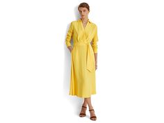 LAUREN Ralph Lauren Long Sleeve Day Dress - Women's Clothing : Yellow Lily : The LAUREN Ralph Lauren Long Sleeve Day Dress is a Surplice Georgette Midi Dress featuring a faux-wrap bodice, a belted waist, and side on-seam pockets. Lightweight and breathable fabric. Collar with swooping V-neckline. Long sleeves with tie detail on waistline. Side on seam pockets. 100% polyester. Dry clean. Imported. Fitted V-neck Belted Dress For Daywear, V-neck Belted Dress With Belted Cuffs For Work, Belted V-neck Wrap Dress For Work, V-neck Belted Wrap Dress For Work, Belted V-neck Daywear Dresses, Spring V-neck Belted Dress For Daywear, Daywear Dress With Tie Waist And Surplice Neckline, V-neck Belted Dress For Work, Spring Fitted Belted V-neck Dress