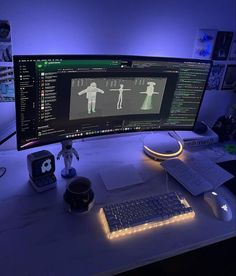 a computer monitor sitting on top of a desk next to a keyboard and mouse,