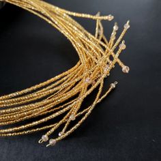 Trendy Handmade Gold Jewelry, Multi-strand Gold Jewelry For Celebration, Trendy Yellow Gold Necklace For Parties, Elegant Festive Metal Choker, Elegant Gold Beaded Necklace With Spacer Beads, Gold Pendant Necklace For Party, Festive Multi-strand Gold Jewelry, Gold-tone Beaded Party Jewelry, Adjustable Gold Choker Necklace