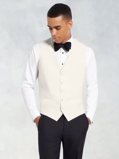 Elegant Semi-formal Spring Vest, Formal Tuxedo Style Vest, Formal Tuxedo Style Sleeveless Vest, Sleeveless Tuxedo Vest For Formal Events, Classic Fitted Satin Suit, Formal Silk Vest For Spring, Elegant Solid Color Sleeveless Sweater Vest, Classic Fitted Silk Outerwear, Tailored White Vest For Semi-formal Occasions