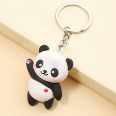 a key chain with a panda bear on it