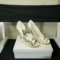 Size 7 New With Original Bundle With Other Items For The Best Savings! Be Sure To Follow Us To See New Shoe Postings At Great Prices. Top Rated Seller And Posh Ambassador. Classic Open Toe Wedding Heels, Classic Cream Wedding Shoes, Classic Cream Heels For Wedding, Cream Round Toe Wedding Shoes For Bridal Shower, Classic Cream Wedding Heels, Formal Cream Wedding Shoes With Round Toe, Cream Almond Toe Wedding Shoes For Formal Occasions, Cream Open Toe Wedding Shoes For Evening, Cream Wedding Shoes With 4-inch Heel For Formal Occasions