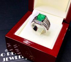 BRAND-NEW!! ONE OF A KIND, HANDCRAFTED RING. EXQUISITE AND FINE CRAFTSMANSHIP! HANDMADE TO LAST FOR AN ETERNITY!! HEIRLOOM PIECE!! PRECIOUS JEWELRY TO BE PASSED ON! PERFECT DRESS RING FOR A LADY OR A GENTLEMAN! 4.25 total carats weight, Certified, Natural emerald ring. This ring offers an important statement of who you are with a jumbo 3.51 carats, VIVID GREEN, transparent, ZAMBIAN EMERALD. Accentuating the EMERALD are the 40 SUBSTANTIAL E/VS, sparkling natural diamonds SUGGESTED RETAIL VALUE: $ Luxury Diamond-cut Emerald Ring For Formal Occasions, Luxury Emerald Ring With Diamond Cut For Formal Occasions, Luxury Emerald Ring With Diamond Cut For Formal Events, Luxury Hallmarked Emerald Signet Ring, Luxury Diamond Cut Emerald Ring As Gift, Luxury Emerald Ring With Diamond Cut For Gift, Luxury Emerald Ring With Diamond Cut As Gift, Luxury Diamond Cut Signet Ring As Gift, Luxury Diamond Cut Signet Ring For Gift