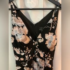 Pre-Owned. Like New. Worn Once! Purchased From Bloomingdale’s. Features Deep V-Neck V-Back Sleeveless Darted Bust Fitted Bodice Seamed Waist Draped Illusion Skirt Allover Floral-Embroidered Mesh Concealed Back Zip With Hook-And-Eye Closure Partially Lined Luxury V-neck Embroidered Evening Dress, Luxury V-neck Dress With Floral Applique, Floral Embroidered V-neck Evening Dress, Embroidered V-neck Beachwear Dress, Black V-neck Dress With Floral Embroidery, Fitted Bodice, Bodice, Like New, V Neck