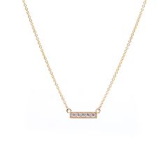 The Heirloom Bar Necklace from The GATES Collection by M. Flynn features 5 diamonds set in 14K yellow gold. Wear this simple and timeless necklace alone or layer with a few other pieces. 
The GATES Collection by M. Flynn is a jewlery collaboration with interior designer and blogger, Erin Gates. Everyday Yellow Gold Diamond Bar Necklace, Gold Minimalist Diamond Bar Necklace, Everyday Gold Bar Necklace With Diamond, Minimalist Gold Diamond Bar Necklace, Minimalist Yellow Gold Bar Necklace With Diamond Accents, Minimalist Bar Necklace With Single Cut Diamonds For Gift, Gold Bar Necklace With Single Cut Diamonds As Gift, Timeless Necklace, Erin Gates