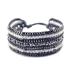 The intricate weaving of this shiny bracelet is like nothing you've seen before. Inspired on the juxtaposition of the bling and the matte, this piece is the ideal hippie chic yet classy weekend look.Bracelet Details: Chic metallic button closure Adjustable with two size options Hippie Size & Fit:L x W: 8 x 1 Trendy Woven Jewelry For Festivals, Trendy Woven Braided Bracelet, Trendy Woven Bracelet Jewelry, Trendy Silver Metal Beaded Bracelets, Adjustable Silver Metal Braided Bracelet, Trendy Adjustable Cuff Bracelet For Party, Silver Beaded Bracelets With Strap For Party, Adjustable Nickel-free Metal Braided Bracelets, Trendy Silver Braided Metal Bracelet