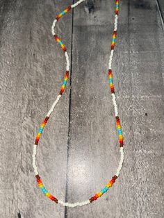 Off white and Aztec sunset pattern seed beaded 16 inch claw clasp necklace/choker White Festival Necklaces With Lobster Clasp, White Necklace With Lobster Clasp For Festivals, White Bohemian Choker With Colorful Beads, Bohemian Single Strand White Beads, White Choker Necklace For Festival, White Bohemian Single Strand Beads, Bohemian White Single Strand Beads, Multicolor Round Beads Choker With Lobster Clasp, White Adjustable Beaded Necklace With Lobster Clasp