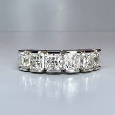 "Lab grown diamond stacking wedding band, half eternity diamond matching wedding band solid gold, lab created diamond anniversary band,  The ring pictured is lab grown diamonds #8230 To shop more styles click here: https://etsy.me/3Pzzwpx For more lab grown diamonds click here: https://etsy.me/3rx1yIs For more engagement rings click here: https://etsy.me/3Xq7mzb Lab Grown Diamonds are all made to order and are a final sale Lab Grown Diamond takes approximately 5-10 business to complete and ship Wedding Radiant Cut Channel Set Diamond Ring, Radiant Cut Channel Set Diamond Ring, Luxury Moissanite Channel Set Eternity Band, Elegant Moissanite Channel Set Eternity Band, Silver Diamond Channel Set Eternity Band, Thick Wedding Band, Thick Wedding Bands, Simple Wedding Band, Simple Wedding Bands