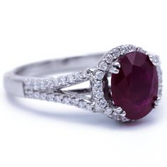 an oval shaped ruby and diamond ring