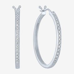 Add a touch of sparkle to your jewelry collection with these stunning 1/10 CT. T.W. Natural Diamond Hoop Earrings, elegantly crafted in sterling silver. Featuring a sleek and timeless design, each earring showcases a series of round, prong-set diamonds that create a beautiful shimmer. The hinged back ensures a secure and comfortable fit, making them perfect for everyday wear or special occasions. Packaged in a lovely gift box, these earrings make a thoughtful gift for someone special, especially April Birthday, Earrings Hoop, Diamond Hoop Earrings, Yes Please, White Diamond, Lovely Gift, Prong Setting, Thoughtful Gifts, Natural Diamonds