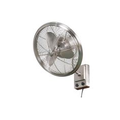 a wall mounted fan on the side of a white wall with a light attached to it