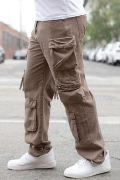 Elevate your casual wardrobe with our Baggy Fit Cargo Pants, designed to combine style, comfort, and functionality. Crafted with precision, these pants offer a relaxed fit and practical features for everyday wear.Key Features:Fabric: Made from 100% cotton, featuring a garment-washed finish for added softness and durability.Fit: Baggy fit for a relaxed and contemporary silhouette.Color Options: Available in taupe.Sizes: Offered in a range of waist and inseam sizes, including 30/30, 32/30, 34/30, Plus Size Mens Clothing, Cargo Pants Baggy, Fit Cargo Pants, Cart Ideas, Utility Pockets, Activewear Sets, Fleece Joggers, Cargo Pants Men, Taupe Color