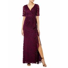 a woman wearing a long purple dress with lace on the sides and side slits