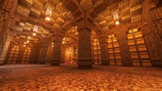 an empty room with wooden columns and windows in the ceiling is lit up by lights