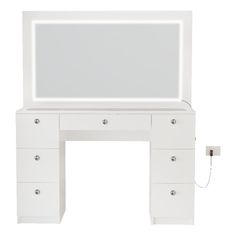 a white desk with drawers and a mirror