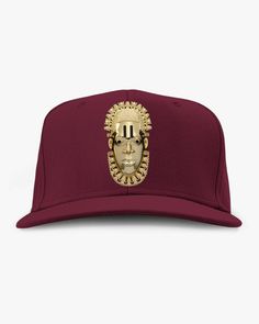 This structured cap features an adjustable snapback, making it an ideal fit for any head size. The Queen Idia metal coating is available in a range of luxury colours, including Gold, Silver, Rose Gold, and Black. Burgundy 1 size fits most Adjustable Diameter: 20.5in/52cm - 23.5in/59.6cm Adjustable Gold Cap, Gold Adjustable Cap, Gold Adjustable Flat Brim Trucker Hat, Adjustable Flat Crown Baseball Cap, Gold Snapback Hat With Adjustable Flat Brim, Gold Flat Brim Hat, One Size Fits Most, Adjustable Gold Snapback Hat With Flat Brim, Gold Flat Brim Hat One Size, Gold Snapback Baseball Cap For Streetwear