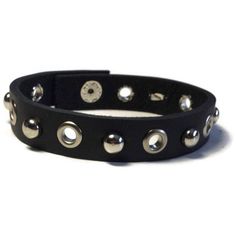 "Studded Leather Bracelet - Silver Grommet Studded Matte Black Leather Wristband - 1/2 Inch Black Leather Wristband This black leather wristband is 1/2 wide and about 8 inches long. It can fit a wrist 7.5\" around. The strap is made of handcut cowhide Genuine leather. It have added 6 Grommet Studs evenly spaced across the center and alternated with 6mm silver dome studs. I have added a silver snap button closure on the ends. It's a strong snap...it does not unsnap easily so there is no fear of i Edgy Band Bracelet For Concerts, Edgy Band Bracelet For Concert, Adjustable Punk Wristband For Concerts, Black Punk Bracelets For Festival, Adjustable Edgy Wristband For Party, Edgy Black Bracelet For Festivals, Edgy Black Bracelet For Festival, Black Punk Festival Bracelets, Edgy Black Festival Bracelet