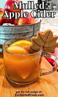 Mulled apple cider in a glass mug with sliced apples, orange, and a spiced leaf shaped cookie perched on the rim of the glass with text overlays. Apple Cider Food Recipes, Warm Apple Cider Recipe, Fall Festival Treats, Mulled Apple Cider Recipe, Fall With Friends, Apple Cider Uses, Curry Pumpkin, Apple Cider Bar, Making Apple Cider