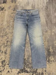 ⚡⚡ DESCRIPTION ⚡⚡ Made in : Japan Materials : Cotton Condition : Distressed, Refer Photo Details Waist : 33 in Inseam : 28 in Leg Opening : 8.5 in Front Rise : 12.5 in Thigh : 11.5 in Knee : 9 in ⚠️ All the measurement taken with the garment flat on the floor.please check the photo and measurement carefully.All item is used and don't expect it in perfect condition.please ask me for more information about the item. ⚠️ Do not rely on tag size as pre-worn items may have been altered, stretched or s Worn Jeans, Jeans Pant, Levi's 505, Levis 505, Early Fall, Mens Clothing, Vintage Levis, Distressed Jeans, Jeans Pants